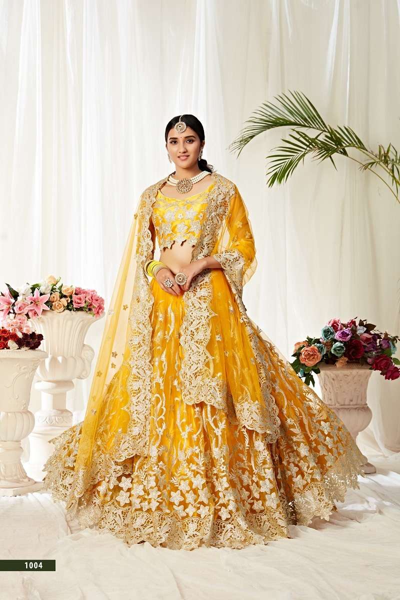 AGNILEKHA 1004 YELLOW BY AAWIYA DESIGNER SOFT NET HEAVY LEHENGAS